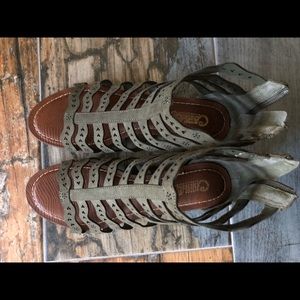 Dark olive green Carlos Santana strappy sandals.